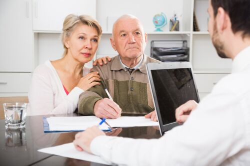 Old man and woman in social department